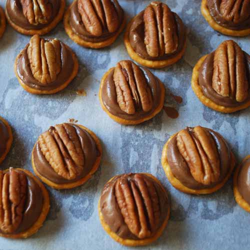 Just baked, a pecan pressed on top.