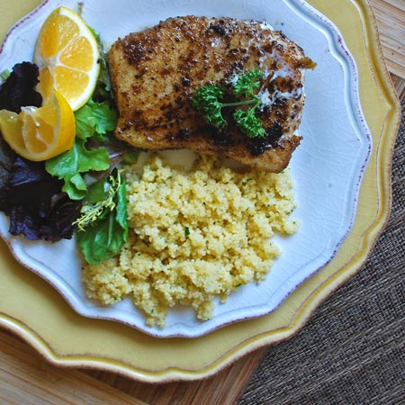 Dinner Plate of Chilean Sea Bass with Coucous and Salad