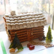 Miniature log cabin of pretzels and shredded wheat cereal